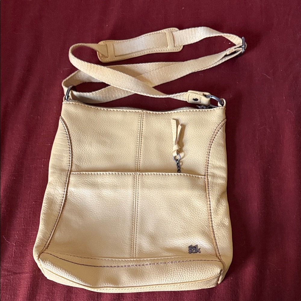 The Sak yellow Crossbody Bag with Adjustable Strap and Semi-Structured Design